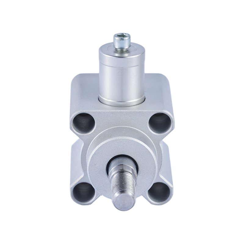 The front view shows the KP-Z device with a square aluminum housing, four mounting holes, a central threaded clamping rod, and a cylindrical actuator on top.